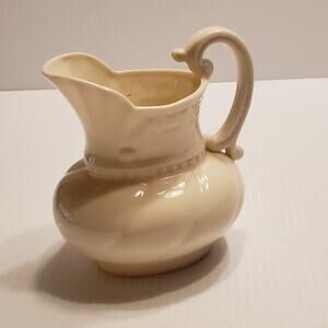 Lenox small off-white porcelain pitcher.  Pre-owned, perfect shape